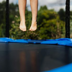 Photo by Karolina Kaboompics on <a href="https://www.pexels.com/photo/person-jumping-on-trampoline-4964509/" rel="nofollow">Pexels.com</a>